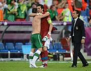 18 June 2012; Gianluigi Buffon, Italy, and Sean St. Ledger, Republic of Ireland, along with Italy manager Cesare Prandelli, right, at the end of the game. EURO2012, Group C, Republic of Ireland v Italy, Municipal Stadium Poznan, Poznan, Poland. Picture credit: David Maher / SPORTSFILE