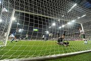 18 June 2012; Shay Given, Republic of Ireland, lies helpless after Mario Balotelli, Italy, scored his side's second goal. EURO2012, Group C, Republic of Ireland v Italy, Municipal Stadium Poznan, Poznan, Poland. Picture credit: Brendan Moran / SPORTSFILE