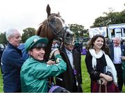 9 September 2017; Andrea Atzeni with Decorated Knight after winning the QIPCO Irish Champion Stakes during the Longines Irish Champions Weekend 2017 at Leopardstown Racecourse in Leopardstown, Co Dublin. Photo by Matt Browne/Sportsfile