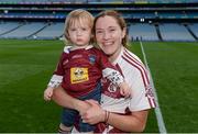 10 September 2017; Westmeath's Elaine Finn with her son Liam, 19 months, after the Liberty Insurance All-Ireland Premier Junior Camogie Championship Final match between Dublin and Westmeath at Croke Park in Dublin. Photo by Piaras Ó Mídheach/Sportsfile