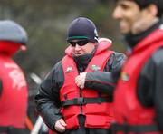 19 June 2012; Ireland head coach Declan Kidney zips up his life jacket before getting on the Shotover Jet, on squad activity day ahead of their Steinlager Series 2012 3rd test, game against New Zealand on Saturday. Ireland Rugby Squad Activity Day, Queenstown, New Zealand. Picture credit: Dianne Manson / SPORTSFILE