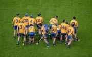 17 June 2012; The Clare team break from the team photograph. Munster GAA Hurling Senior Championship Semi-Final, Clare v Waterford, Semple Stadium, Thurles, Co. Tipperary. Picture credit: Stephen McCarthy / SPORTSFILE