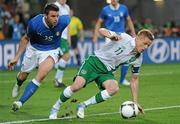 18 June 2012; Damien Duff, Republic of Ireland, in action against Andrea Barzagli, Italy. EURO2012, Group C, Republic of Ireland v Italy, Municipal Stadium Poznan, Poznan, Poland. Picture credit: Brendan Moran / SPORTSFILE