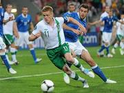 18 June 2012; Damien Duff, Republic of Ireland, in action against Andrea Barzagli, Italy. EURO2012, Group C, Republic of Ireland v Italy, Municipal Stadium Poznan, Poznan, Poland. Picture credit: Brendan Moran / SPORTSFILE