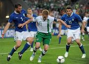 18 June 2012; Damien Duff, Republic of Ireland, in action against Thiago Motta, left, and Andrea Barzagli, right, Italy. EURO2012, Group C, Republic of Ireland v Italy, Municipal Stadium Poznan, Poznan, Poland. Picture credit: Brendan Moran / SPORTSFILE