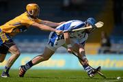 17 June 2012; Shane Walsh, Waterford, scores his side's second goal despite the attention of Cian Dillon, Clare. Munster GAA Hurling Senior Championship Semi-Final, Clare v Waterford, Semple Stadium, Thurles, Co. Tipperary. Picture credit: Stephen McCarthy / SPORTSFILE