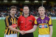 20 June 2012; Referee David Hughes with Kilkenny captain Kevin Kelly, left, and Diarmuid O'Keeffe, Wexford, before tha game. Bord Gáis Energy Leinster GAA Hurling Under 21 Championship Semi-Final, Kilkenny v Wexford, Nowlan Park, Kilkenny. Picture credit: Matt Browne / SPORTSFILE
