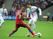 21 June 2012; Cristiano Ronaldo, Portugal, in action against Theodor Gabri Selassie, Czech Republic. UEFA EURO 2012, Quarter-Final, Czech Republic v Portugal, National Stadium, Warsaw, Poland. Picture credit: Pat Murphy / SPORTSFILE