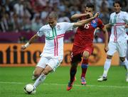 21 June 2012; Pepe, Portugal, in action against Milan Baros, Czech Republic. UEFA EURO 2012, Quarter-Final, Czech Republic v Portugal, National Stadium, Warsaw, Poland. Picture credit: Pat Murphy / SPORTSFILE