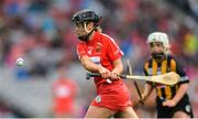 10 September 2017; Laura Treacy of Cork clears her lines ahead of Shelly Farrell of Kilkenny during the Liberty Insurance All-Ireland Senior Camogie Final match between Cork and Kilkenny at Croke Park in Dublin. Photo by Piaras Ó Mídheach/Sportsfile
