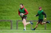 11 September 2017; Darren Sweetnam of Munster supported by team-mate Tyler Bleyendaal during Munster Rugby squad training at the University of Limerick in Limerick. Photo by Diarmuid Greene/Sportsfile