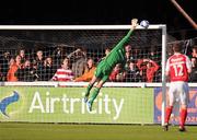 22 June 2012; Danny Joyce, Bohemians, out of picture, scores his side's first  goal over St. Patrick's Athletic's goalkeeper Brendan Clarke. Airtricity League Premier Division, St Patrick's Athletic v Bohemians, Richmond Park, Dublin. Picture credit: David Maher / SPORTSFILE