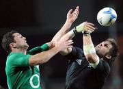 23 June 2012; Rob Kearney, Ireland, and Richie McCaw, New Zealand, contest a loose ball. Steinlager Series 2012, 3rd Test, New Zealand v Ireland, Waikato Stadium, Hamilton, New Zealand. Picture credit: Ross Setford / SPORTSFILE