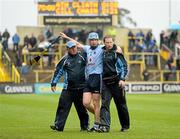 23 June 2012; Joey Boland, Dublin, is assisted from the pitch during the closing stages of the game after picking up an injury. Leinster GAA Hurling Senior Championship Semi-Final, Dublin v Kilkenny, O'Moore Park, Portlaoise, Co. Laois. Picture credit: Stephen McCarthy / SPORTSFILE