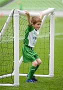 23 June 2012; Six year old Mark Tunney, from Mullingar AFC, relaxes at the eFlow FAI Summer Schools Open Day, Aviva Stadium, Lansdowne Road, Dublin. Picture credit: Ray McManus / SPORTSFILE