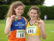 24 June 2012; Gold medal winner Phil Healy, right, from Bandon AC, Co. Cork, with silver medal winner Grainne Moynihan, from West Muskerry AC, Co. Cork, after the Junior Woman's 200m at the Woodie's DIY Junior and U23 Track and Field Championships of Ireland, Tullamore Harriers A.C., Tullamore, Co. Offaly. Picture credit: Matt Browne / SPORTSFILE