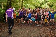 16 September 2017; Former Roscommon GAA footballer Cathal Cregg, and current Roscommon GAA footballer Niall Kilroy joined runners at the Lough Key parkrun where Vhi hosted a special event to celebrate their partnership with parkrun Ireland. Cathal Cregg and Niall Kilroy were on hand to lead the warm up for parkrun participants before completing the 5km course alongside newcomers and seasoned parkrunners alike. Vhi provided walkers, joggers, runners and volunteers at Lough Key parkrun with a variety of refreshments in the Vhi Relaxation Area at the finish line. A qualified physiotherapist was also available to guide participants through a post event stretching routine to ease those aching muscles. parkruns take place over a 5km course weekly, are free to enter and are open to all ages and abilities, providing a fun and safe environment to enjoy exercise. To register for a parkrun near you visit www.parkrun.ie. New registrants should select their chosen event as their home location. You will then receive a personal barcode which acts as your free entry to any parkrun event worldwide. Pictured is former Roscommon GAA footballer Cathal Cregg, as he leads the warm-up, at Lough Key, Co. Roscommon. Photo by Seb Daly/Sportsfile
