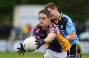 16 September 2017; Conor Kelly of Kilmacud Crokes in action against Robert Butler of Salthill Knockncarra during the Volkswagen7s Senior All Ireland Football 7s semi-final match between Kilmacud Crokes of Dublin and Salthill Knockncarra of Galway at Kilmacud Crokes in Dublin. Photo by Piaras Ó Mídheach/Sportsfile