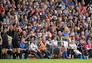 24 June 2012; Lar Corbett, Tipperary, waits to comes on as a late first half substitute to replace Gearoid Ryan, 10. Munster GAA Hurling Senior Championship Semi-Final, Cork v Tipperary, Páirc Uí Chaoimh, Cork. Picture credit: Stephen McCarthy / SPORTSFILE