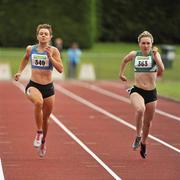 24 June 2012; Eventual winner Steffi Creaner, left, Dublin City Harriers A.C, Co. Dublin, and eventual second place finisher Niamh Whelan, Ferrybank A.C, Co.Waterford, in action during the Womens Under 23 200m event. Woodie&#039;s DIY Junior and U23 Track and Field Championships of Ireland, Tullamore Harriers A.C., Tullamore, Co. Offaly. Picture credit: Tom&aacute;s Greally / SPORTSFILE