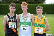 24 June 2012; Gold medal winner Kevin Dooney, centre, Raheny Shamrock A.C., Dublin, with second place Ian Guiden, left, Clonliffe Harriers A.C., Co. Dublin, and third place Jake O'Regan, St. John's A.C., Co. Clare, after the Junior Men's 5000m at the Woodie's DIY Junior and U23 Track and Field Championships of Ireland, Tullamore Harriers A.C., Tullamore, Co. Offaly. Picture credit: Matt Browne / SPORTSFILE