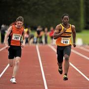 24 June 2012; Oisin Fitzpatrick, left, Nenagh Olympic A.C, Co. Tipperary, and Kaodi Ogbene, right, Leevale A.C, Co. Cork, in action during the Junior Mens 100m event. Woodie's DIY Junior and U23 Track and Field Championships of Ireland, Tullamore Harriers A.C., Tullamore, Co. Offaly. Picture credit: Tomás Greally / SPORTSFILE