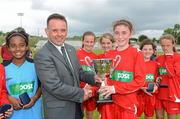 26 June 2012; Robert Moran, Vice-Chairman, FAI Schools, presents Claire Kelly, captain, Monaleen NS, Limerick, with the cup. An Post FAI Primary Schools 5-a-Side Girls “B” Section All-Ireland Finals, Athlone IT, Athlone, Co. Westmeath. Picture credit: Brian Lawless / SPORTSFILE