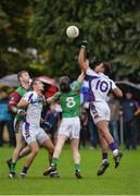 16 September 2017; Karl Dias of Kilmacud Crokes, supported by team-mate Ben Shovlin, left, in action against Eoghan Rua's Niall Holly, and Ruairí Mooney, 8, during the Senior All Ireland Football 7s final match between Kilmacud Crokes of Dublin and Eoghan Rua, Coleraine, of Derry at Kilmacud Crokes in Dublin. Photo by Piaras Ó Mídheach/Sportsfile
