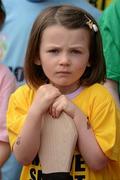 28 June 2012; Four and a half year old Anna Gallogly, from Clontarf, Dublin, relaxes at the launch of 'Move Smart Week' initiative by the Nutrition & Health Foundation and the Camogie Association. Croke Park, Dublin. Picture credit: Ray McManus / SPORTSFILE