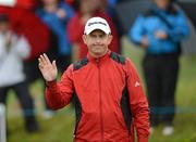 28 June 2012; Peter Lawrie acknowledges the crowd after a putt on the 12th Green during the 2012 Irish Open Golf Championship. Royal Portrush, Portrush, Co. Antrim. Picture credit: Oliver McVeigh / SPORTSFILE