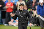 29 June 2012; Rory McIlroy acknowledges the crowd after his putt on the 15th green, during the 2012 Irish Open Golf Championship. Royal Portrush, Portrush, Co. Antrim. Picture credit: Oliver McVeigh / SPORTSFILE