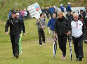 28 June 2012; Rory McIlroy along with his girlfriend Caroline Wozniacki and his father Gerry, right, on the 7th fairway during the 2012 Irish Open Golf Championship. Royal Portrush, Portrush, Co. Antrim. Picture credit: Matt Browne / SPORTSFILE