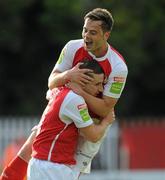 29 June 2012; St. Patrick's Athletic's Greg Bolger is lifted by team mate Dean Kelly after scoring his side's first goal. Airtricity League Premier Division, St. Patrick's Athletic v Shelbourne, Richmond Park, Dublin. Picture credit: Ray Lohan / SPORTSFILE