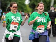30 June 2012; Claire Feeney, left, from Co. Meath, and Evelyn Daly, from Co. Offaly, in action during the Irish Runner 5 Mile Road Race. Phoenix Park, Dublin. Picture credit: Tomas Greally / SPORTSFILE