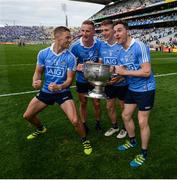 17 September 2017; Dublin players, from left, Paul Mannion, Ciarán Kilkenny, John Small and Paddy Andrews celebrate with the Sam Maguire cup following their side's victory the GAA Football All-Ireland Senior Championship Final match between Dublin and Mayo at Croke Park in Dublin. Photo by Seb Daly/Sportsfile