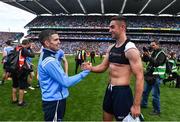17 September 2017; Dublin's James McCarthy shakes hands with Bernard Dunne following the GAA Football All-Ireland Senior Championship Final match between Dublin and Mayo at Croke Park in Dublin. Photo by Ramsey Cardy/Sportsfile