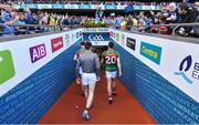 17 September 2017; Mayo players leave the pitch as Eoghan O'Gara of Dublin lifts the Sam Maguire Cup after the GAA Football All-Ireland Senior Championship Final match between Dublin and Mayo at Croke Park in Dublin. Photo by Brendan Moran/Sportsfile