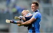 17 September 2017; Dublin's Paul Flynn celebrates with his nephew Caolán, son of Dublin footballer Darren Daly, after the GAA Football All-Ireland Senior Championship Final match between Dublin and Mayo at Croke Park in Dublin. Photo by Piaras Ó Mídheach/Sportsfile