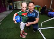 18 September 2017; Dublin footballer Philip McMahon with Mayo supporter Cathal Downey, aged 4, from Co. Kildare during the All-Ireland Senior Football Champions visit to Our Lady's Children's Hospital in Crumlin, Dublin. Photo by David Fitzgerald/Sportsfile