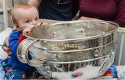 18 September 2017; Dara Cahill, age 9 months, from Clontarf, with the Sam Maguire Cup during the All-Ireland Senior Football Champions visit to Temple Street Children's Hospital in Dublin. Photo by Piaras Ó Mídheach/Sportsfile