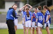 30 June 2012; Cavan manager Mick Flynn speaks to his players during the game. All-Ireland U14 'B' Ladies Football Championship Final 2012, Cavan v Waterford, St Brendan’s Park, Birr, Co. Offaly. Picture credit: David Maher / SPORTSFILE