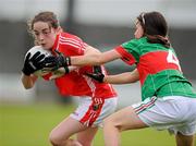 30 June 2012; Nicola Dennehy, Cork, in action against Diane Tierney, Mayo. All-Ireland U14 'A' Ladies Football Championship Final 2012, Cork v Mayo, St Brendan’s Park, Birr, Co. Offaly. Picture credit: David Maher / SPORTSFILE