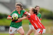 30 June 2012; Michaela Walsh, Mayo, in action against Niamh Lynch, Cork. All-Ireland U14 'A' Ladies Football Championship Final 2012, Cork v Mayo, St Brendan’s Park, Birr, Co. Offaly. Picture credit: David Maher / SPORTSFILE