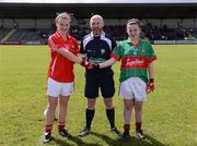 30 June 2012; Referee Gus Chapman with captains Mairead O'Sullivan, left, Cork, and Stacey Mangan, Mayo. All-Ireland U14 'A' Ladies Football Championship Final 2012, Cork v Mayo, St Brendan’s Park, Birr, Co. Offaly. Picture credit: David Maher / SPORTSFILE