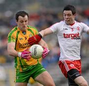 30 June 2012; Michael Murphy, Donegal, in action against Conor Clarke, Tyrone. Ulster GAA Football Senior Championship Semi-Final, Tyrone v Donegal, St Tiernach's Park, Clones, Co. Monaghan. Picture credit: Oliver McVeigh / SPORTSFILE