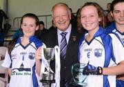30 June 2012; Pat Quill, President, Ladies Gaelic Football Association, with Waterford captain Ciara Hurley, left, and Megan Dunford, player of the game. All-Ireland U14 'B' Ladies Football Championship Final 2012, Cavan v Waterford, St Brendan’s Park, Birr, Co. Offaly. Picture credit: David Maher / SPORTSFILE