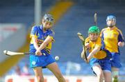 30 June 2012; Ereena Fryday, Tipperary, in action against Marian O'Brien, Clare. All-Ireland Senior Camogie Championship Round Two, Tipperary v Clare, Semple Stadium, Thurles, Co. Tipperary. Picture credit: Ray Lohan / SPORTSFILE