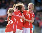30 June 2012; Cork players, left to right, Emer Connolly, Caroline O'Mahony, Laura Cleary and Abbie Scannell celebrate at the end of the game. All-Ireland U14 'A' Ladies Football Championship Final 2012, Cork v Mayo, St Brendan’s Park, Birr, Co. Offaly. Picture credit: David Maher / SPORTSFILE