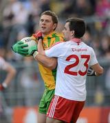 30 June 2012; Ryan Bradley, Donegal, in action against Ryan McMenamin, Tyrone. Ulster GAA Football Senior Championship Semi-Final, Tyrone v Donegal, St Tiernach's Park, Clones, Co. Monaghan. Picture credit: Oliver McVeigh / SPORTSFILE
