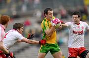 30 June 2012; Michael Murphy, Donegal, in action against Dermot Carlin and Conor Clarke, Tyrone. Ulster GAA Football Senior Championship Semi-Final, Tyrone v Donegal, St Tiernach's Park, Clones, Co. Monaghan. Picture credit: Oliver McVeigh / SPORTSFILE